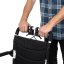 Transportní invalidní vozík MOBIL-TIM, doprovod předvádí použití brzd pro bezpečné zastavení Transportní invalidní vozík MOBIL-TIM, doprovod předvádí použití brzd pro bezpečné zastavení